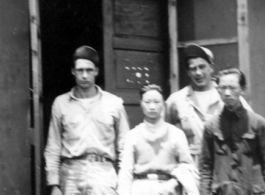 At the line mess hall, Yangkai 1944.  Frank Bates, Leo Lacher, Lee & his brother.  From the collection of Frank Bates.