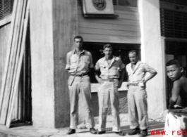 Frank Bates, Johnny Burns, and George Butsika at the Lucky Cafe in Liuzhou, China. Sept 1944.