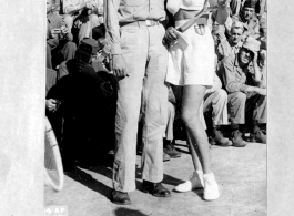 Lt. Earle Meadows, former Olympian and USC pole vault champ, poses with Jinx Falkenburg, movie star, in China during WWII.