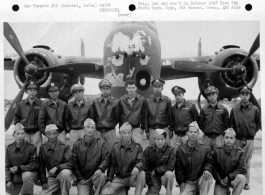 Personnel of a Chinese and American Overseas Training Unit Bomber Command lined up in front of a North American B-25 Mitchell at Karachi, India.