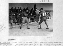 Chinese soldiers in the CBI learn western-style boxing under instruction of Capt. Mark Conn, during WWII.