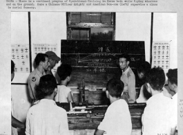 A Chinese officer and American non-com supervise a class in aerial gunnery in the CBI during WWII, as part of Operational Training. 