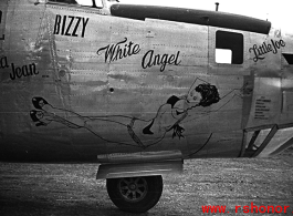 Nose art of a Consolidated C-109 (a modification of the B-24 bomber) "White Angel" in the CBI during WWII. The cockpit window is labeled with a large uppercase "BIZZY." Probably serial #44-49059.