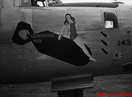 Nose art of a B-24 bomber, showing a women riding a falling bomb. During WWII, in China.