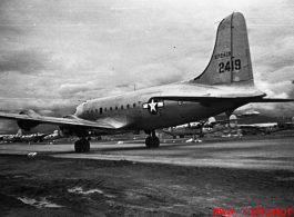 A C-54, tail #272419. At an American air base in WWII in Yunnan province, China, most likely around the Luliang air base area.