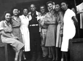 Celebrities visit and perform at Yangkai, Yunnan province, during WWII: Mary Landa and Ruth Dennis on far left, and Ann Sheridan third from right, during visit medical staff, likely at Yangkai.