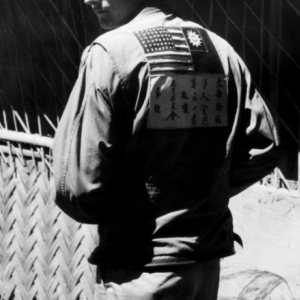 Robert Frederick Riese, shown here with flight jacket and 'blood chit' in China.