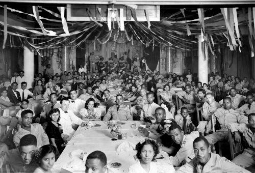 A fascinating and rare image of a party or similar celebration of mostly African American CBIers. 