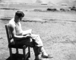 Selig Seidler, a member of the 16th Combat Camera Unit, taking a break at Guilin (Kweilin) or Liuzhou (Liuchow) base, in Guangxi province, China, during the Second World War.