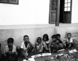 Local kids--with portions of food--in India during WWII.