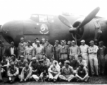 American flyers and mechanics, ground support, etc. gather for a group photo before a Ringer Squadron B-25 Mitchell. Yangkai, May or June 1944?