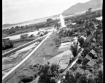 Bombing of Đò Lèn Bridge in Hà Trung Town in French Indochina (Vietnam), during WWII. In northern Vietnam, and along a critical rail route used by the Japanese.