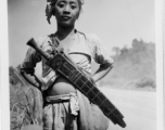 Local people in Burma near the 797th Engineer Forestry Company--a man with a large knife.  During WWII.