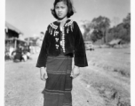 Local people in Burma near the 797th Engineer Forestry Company--A Kachin girl dress for Christmas on December 25, 1944, in Burma.  During WWII.