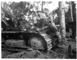 797th Engineer Forestry Company in Burma, repair bulldozer used for logging for bridge building along the Burma Road.  During WWII.