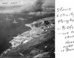 Shows intense activity in the Hong Kong raid - B-24's came in high - we came in just above water - Heavy cloud to right top of photo is from B-24 bombs. From an October 16, 1944, mission on Hong Kong, 491st Bomb Squadron.