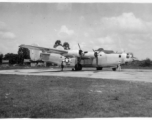 A B-24 bomber on pavement at an airbase in in Burma during WWII.