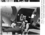Selig Seidler plays patient being loaded into or out of a C-47 transport in a publicity movie:"During filming for nurses publicity move. Acting as stretcher case, S. Seidler, feeling fine."