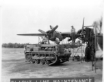 Flightline maintenance of a F-7/B-24 in India. 24th Combat Mapping Squadron, 8th Photo Reconnaissance Group, 10th Air Force