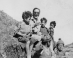 An American GI with Chinese kids in SW China during WWII.  From the collection of David Axelrod.