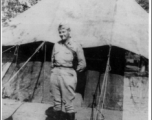 7th Veterinary Company GI posing before tent during WWII.