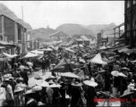 A crowded street in Liuzhou in 1945, during WWII. This should be south of the river.