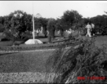 GIs in the CBI visiting a military graveyard during WWII.