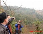 Mr. YA pointing to the hillside where the plane crashed.  Villagers say the plane came in at night, in the dark, then circled dropping flares, before finally crashing.  A large number of Chinese soldiers were on the plane, supposedly just returned from training abroad, and all died, along with the two Americans. At least one additional American bailed out of the airplane, was injured, but ultimately survived, and was taken from the valley a couple days after the crash.