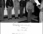 "Casey Vincent crew award." During WWII. Clinton D. "Casey" Vincent is the tall one in back, second from the right.  Far left is probably  Lt. Col. Grattan "Grant" Mahony (commander of the 76th Fighter Squadron).