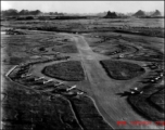 P-51s, L-6s, and other planes at the Liuzhou (Liuchow) air base during the summer or fall of 1945.  The distinct karst mountains of the area are visible in the background.  Photos taken by Robert F. Riese in or around Liuzhou city, Guangxi province, China, in 1945.