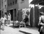 Scenes around Kunming city, Yunnan province, China, during WWII: A street side stall.