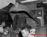 Mechanic on truck engine, needed to keep a truck running in China (CBI) during WWII.