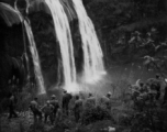 American GIs traveling through Guizhou province, near Anshun city, stop for a look at the dramatic Huangguoshu Falls during WWII. 