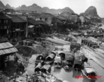 Houses, boats, and products along the riverside on the southside, at Liuzhou city, Guangxi province, China, near the US Airbase during the Second World War.  Photo from Selig Seidler.