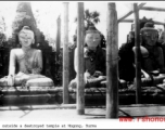 Buddhist statues at Mogong, Burma, outside destroyed temple. During WWII.