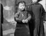 A pair of cute kids near Kunming, China, during WWII.  Image provided by Dorothy Yuen Leuba.