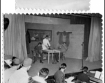 Various scenes from a variety show to entertain the troops in the CBI during WWII.  This particular images seems to be of a "Special Service Show in Kunming, China, Xmas 1944," and may have originally belonged to Addie Bailey.