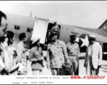 Chennault disembarks from a C-46, #476439, in Xi'an, China, to say farewell to the troops in 1945.