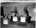 GIs of the "Esquires" play music at the E. M. Club at the city of Nanjing (Nanking) in China during WWII.