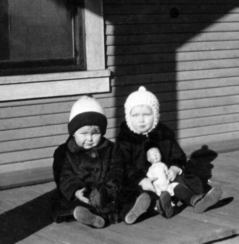 Hal Geer, on left, with a visiting friend, at childhood home at Picher, Oklahoma.