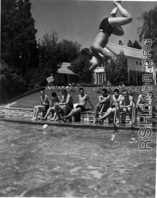 GIs do poolside R&R, during WWII, at hilltop rest house or manor house. In India? Ceylon?