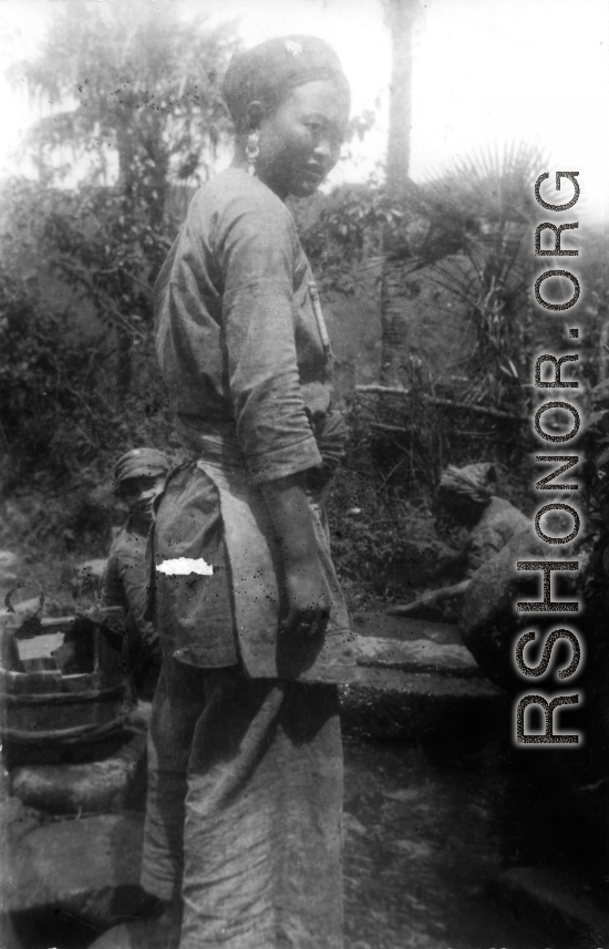 Local ethnic minority woman in Yunnan, China (or Burma) during WWII.
