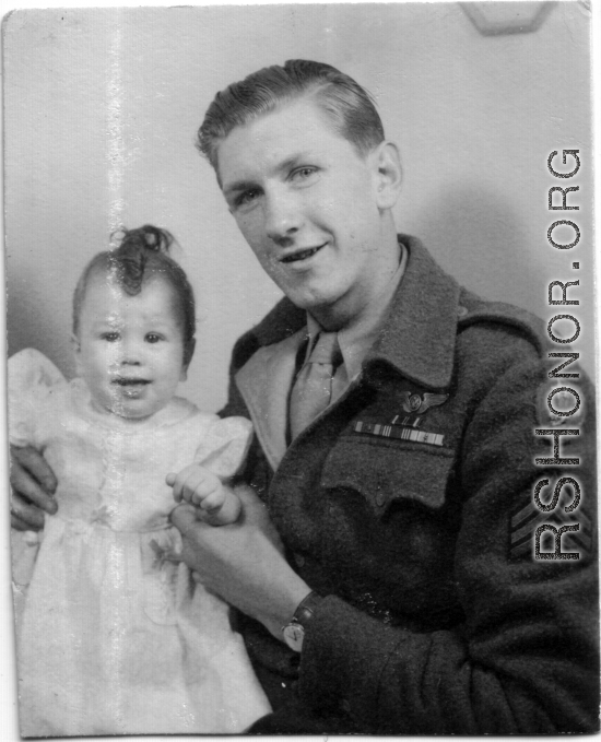 John Jacob Gerber, of the 322nd Troop Carrier Squadron, returned to the US and finally meeting his daughter, born September 1, 1944.