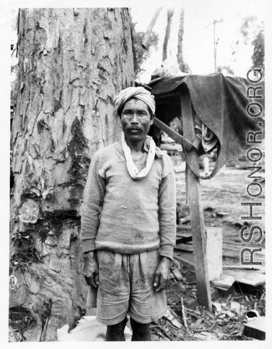 Local people in Burma near the 797th Engineer Forestry Company: A local man, hired to work at the lumber mill.  During WWII.