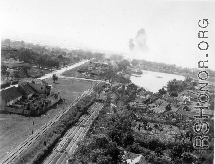 Bombing on Phu Lang Thuong railway bridge over the Thuong River at Bắc Giang City in French Indochina (Vietnam), during WWII. In northern Vietnam, and along a critical rail route used by the Japanese.  Coordinates:  21°16'32.69"N 106°11'9.28"E