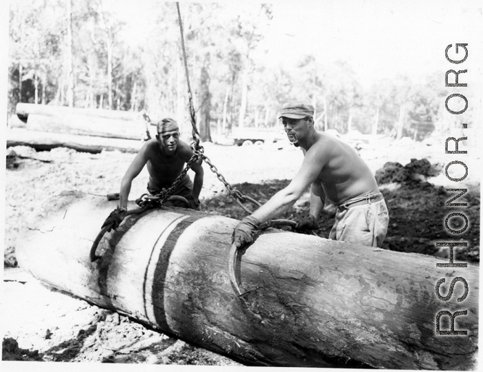 797th Engineer Forestry Company mill in Burma, loading logs for milling for bridge building along the Burma Road.  During WWII.