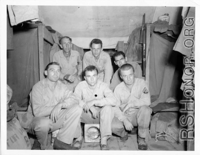 Engineers of the 797th Engineer Forestry Company pose in their barracks in Burma.  During WWII.