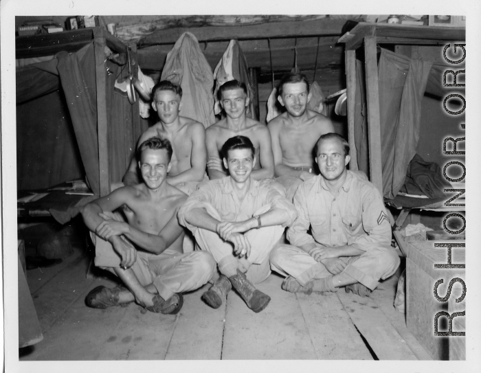 Engineers of the 797th Engineer Forestry Company pose in their barracks in Burma.  During WWII.