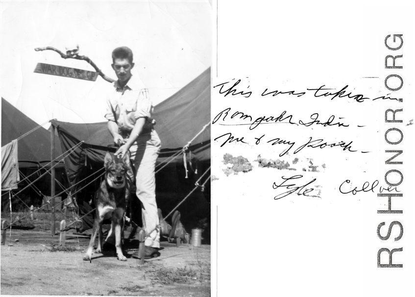 GI restrains his war dog in Ramgarh, India, during WWII. The sign behind him seems to say, "War Dog Detachment Camp."  Photo from Lyle Collver.