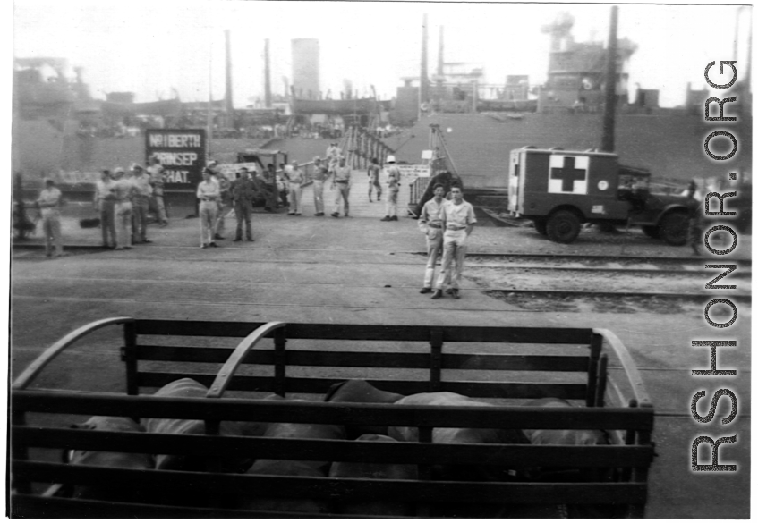 A ship and medical transport at the No. 1 Berth of the Princep Ghat in India, during WWII.